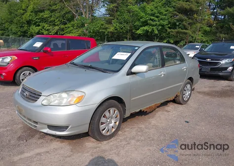 2003 Toyota Corolla Le z USA, uszkodzony, nr VIN JTDBR32EX30015439